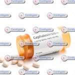 A bottle of Cephalexin capsules, an antibiotic used to treat bacterial infections, displayed with dosage information, available on CureTypes.com.